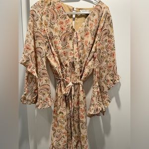 Printed faux wrap dress with ruffle sleeves